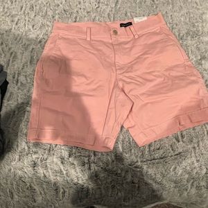 *Real Men Wear Pink!* Size 32 waist, pink shorts by St. John’s Bay.
